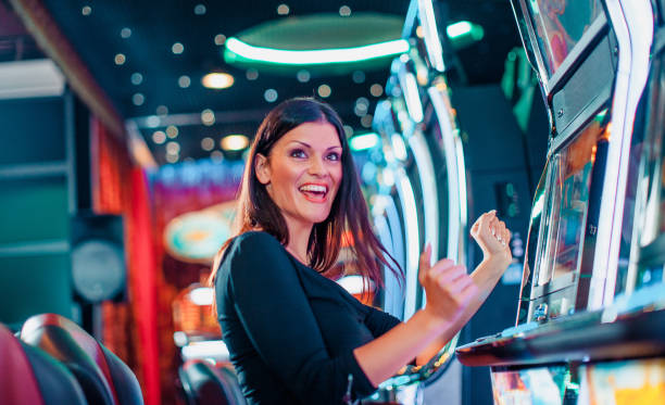 Live Casino Hold'em table with dealer and community cards displayed on screen